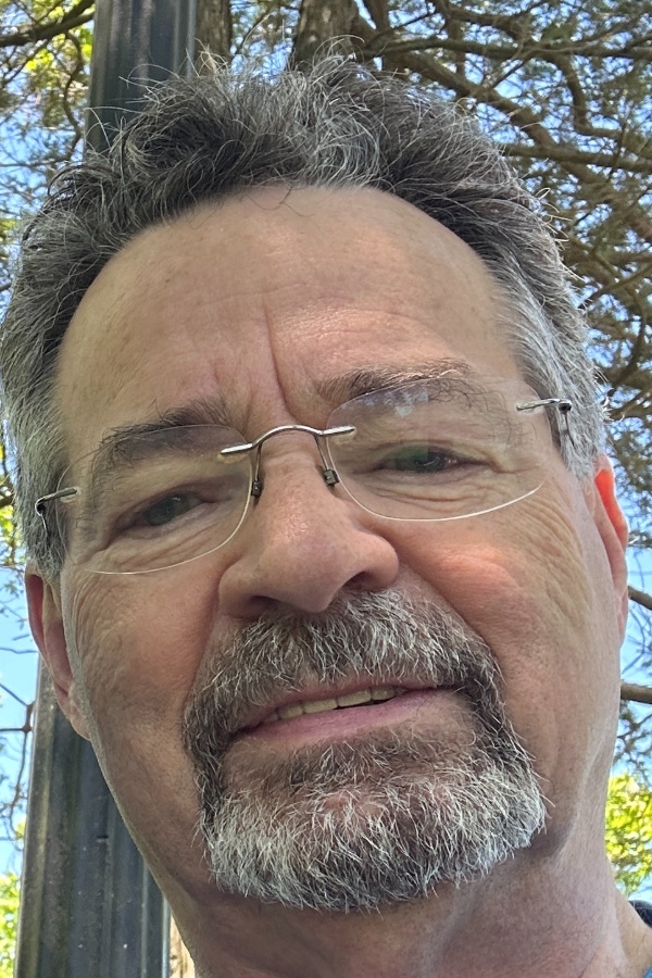 Cruise Brothers Travel Agent John Dexter